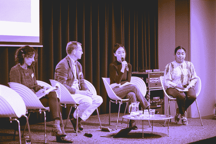 An on-stage discussion between four panel members